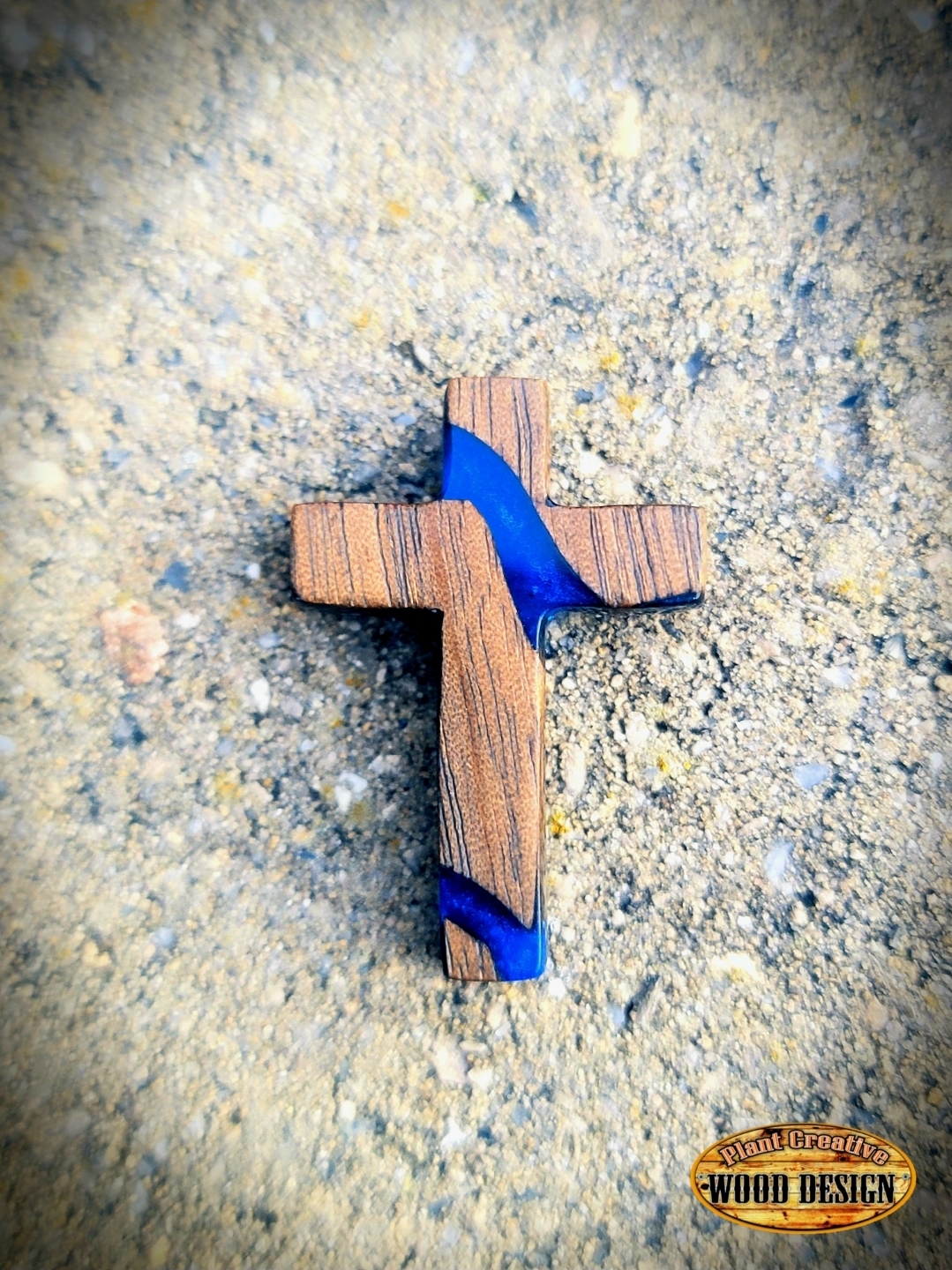 1.5" tall walnut and maple epoxy cross necklace charms. Will have hole drilled through the top with a metal ring/loop to attach to your favorite necklace. Include in comments walnut or epoxy, color of epoxy, and whether you want the epoxy clear or opaque.