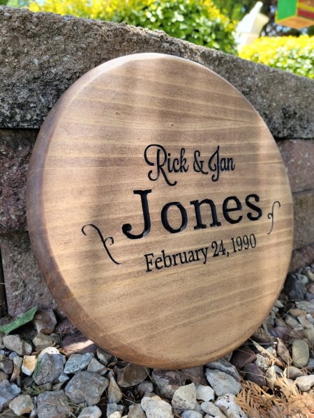 This 12" rounded wood sign is perfect for weddings, engagement gifts, anniversaries, birthdays, and so much more. We will engrave your personalized information onto the sign for free. 