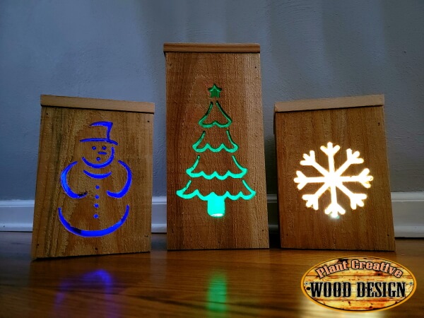 Made with 100% cedar wood. Please specify in the comments section of your order which 3 designs you want. The choices are christmas tree, snowflake, snowman, gingerbread man, and The Grinch. Includes lights in each lantern and batteries. 